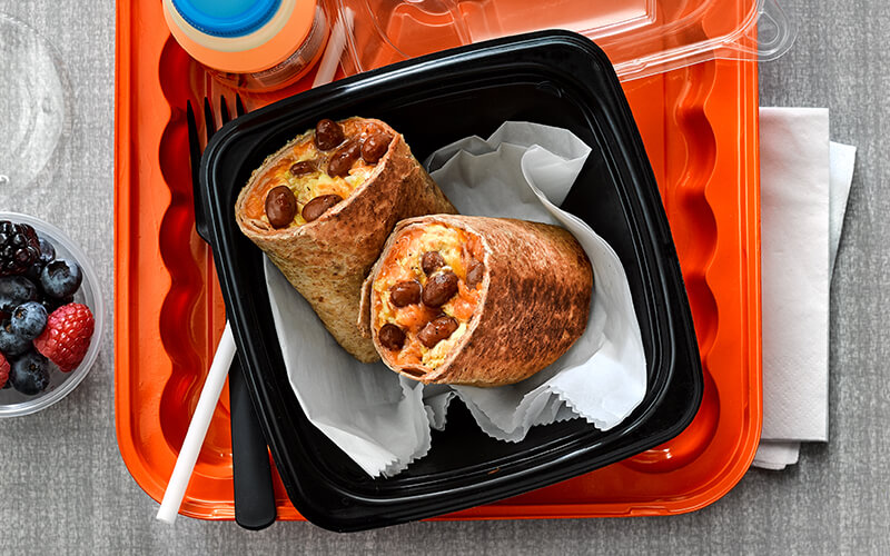 Bush's Best® Easy Entrées® Texas Ranchero Pinto Beans help create a Huevos Ranchers Breakfast Wrap foodservice recipe perfect for K-12 lunchrooms. Completed with a side of fresh berries.